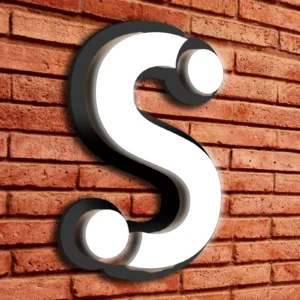 Channel letter signs mounted on a backer panel cut in the shape of a letter